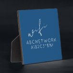 Personalisiertes WiFi-Kennwort - Blau Fotoplatte<br><div class="desc">Mit dieser personalisierten blauen Tafel, die Ihren Netzwerknamen und Ihr Kennwort anzeigt, können Sie sich einfach mit Ihrem WiFi verbinden. Das Design zeichnet sich durch einen modernen blauen Hintergrund mit weißem Text und einen anpassbaren Bereich für Ihre Netzwerkdetails aus. Diese Produktversion ist 5, 25 x 5, 25 Zoll und wird...</div>