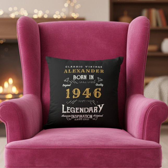 Personalized 80th Birthday Born 1946 Legend Black Kissen (Born 1946 throw pillow on a pink chair.)
