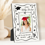 Personalized Doodle Photo Congrats Grad Fotoplatte<br><div class="desc">A charming graduation plaque featuring a senior photo surrounded by a whimsical hand-drawn doodle border with a graduation cap, stars, and confetti on a clean white background. The Congrats headline leads into the graduate's name in script with the school name and class year below. A playful tabletop keepsake for displaying...</div>
