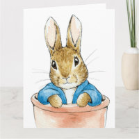 Peter das Kaninchen sitzt in einem Pflanze Pot