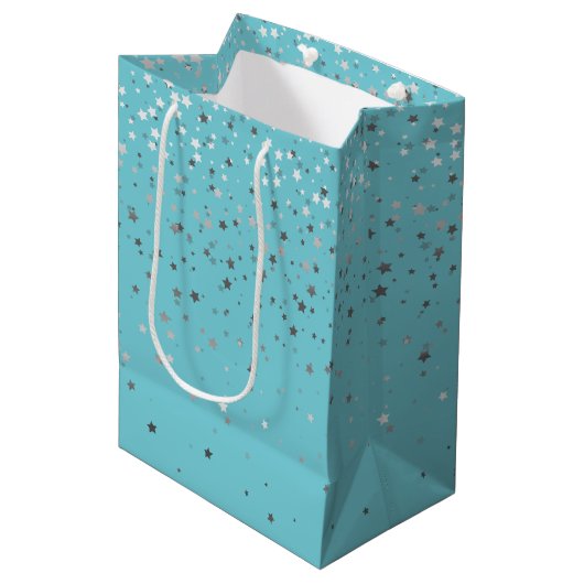Petite Silver Stars Geschenktasche auf Türkis Mittlere Geschenktüte (Vorderseite Schrägansicht)