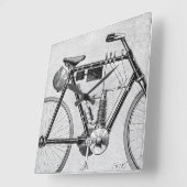 Petrolette Omega Motorcycle, 1895 Quadratische Wanduhr (Winkel)