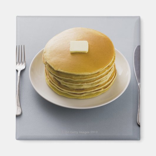 Pfannkuchen mit Butter auf einem Teller Magnet (Vorne)