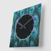 Pfau versieht Aqua mit Federn Quadratische Wanduhr (Winkel)