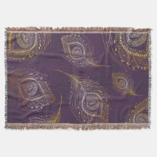 Pfauenfeder aus Gold, violetter Hintergrund. Decke