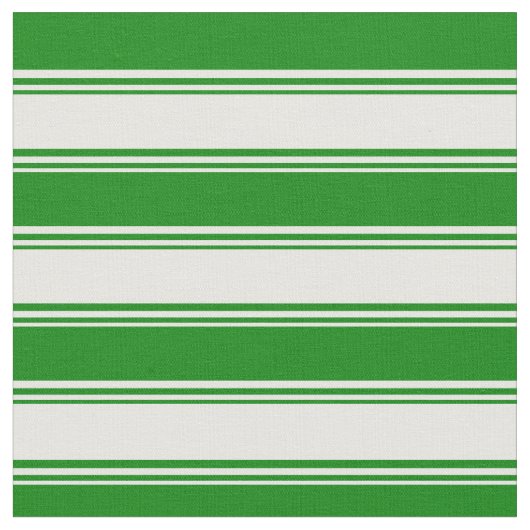 Pfefferminzcreme und grüne, farbige Linienmuster Stoff (Nahaufnahme)