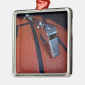 Pfeife-Erholungen eines Referenten auf a Silbernes Ornament (Links)