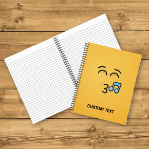 Pfeifendes Gesicht mit lächelnden Augen Notizbuch