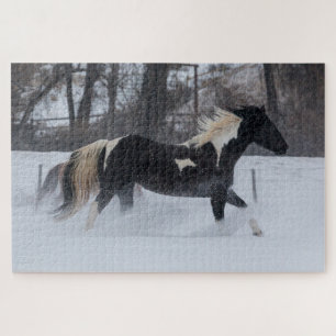 Pferd läuft durch den Schnee Puzzle