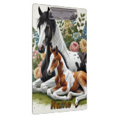 Pferde, die sich zwischen lebendigen Blume und Pfl Klemmbrett (Rechts)