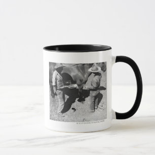 Pferde mit dem Pitchfork Brand brandmarken Tasse