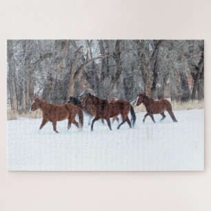 Pferdeherde läuft im Winterschnee Puzzle