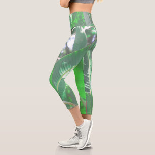 Pflanze aus grünem Blattbanan, pastellfarben Capri Leggings