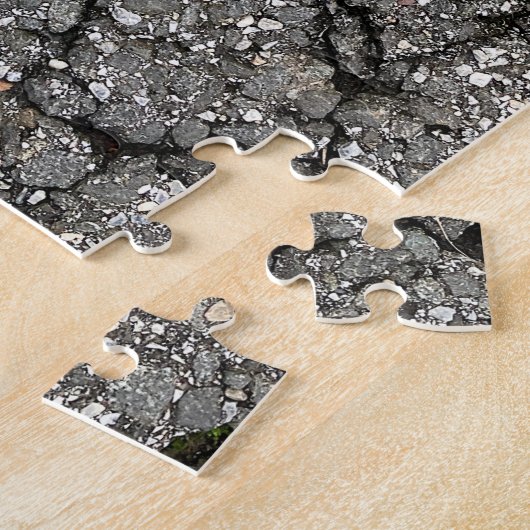 Pflasterzement aus schwarzem Asphalt Puzzle (Seite)