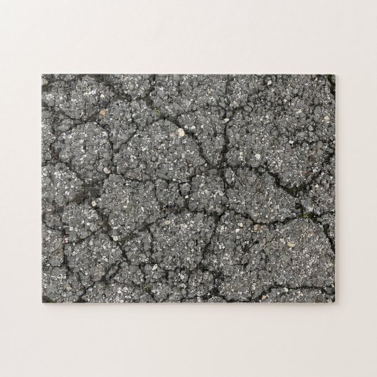 Pflasterzement aus schwarzem Asphalt Puzzle (Horizontal)