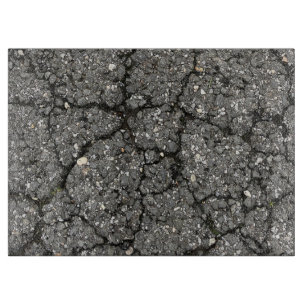 Pflasterzement aus schwarzem Asphalt Schneidebrett