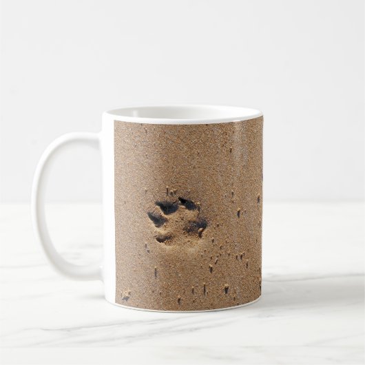 Pfotendrucke in Sand Kaffeetasse (Links)