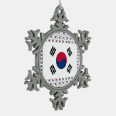 Phantastische Südkorea-Keramik Schneeflocken Zinn-Ornament (Links)