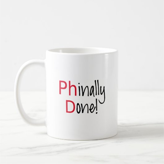 Phinally getan, PhD-Absolvent, Abschlussgeschenk Kaffeetasse (Links)
