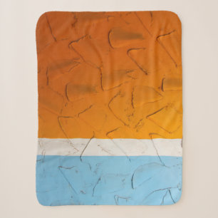 Photo of orange, white, and blue artwork sherpadecke