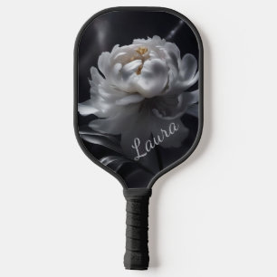 Pickleball-Paddel mit weißer und schwarzer Flora Pickleball Schläger