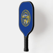 Pickleball Paddle unter der Flagge Nebraskas, USA (Links)