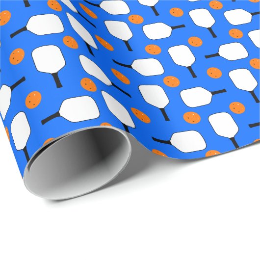 Pickleball Paddles, Orange Pickleball Balls, blau Geschenkpapier (Rolleneckpunkt)