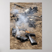 Pieces of enemy weapons lay out to cool off poster (Vorne)