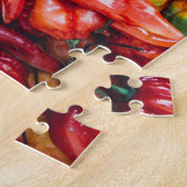Pile der Paprikaschoten des roten Chilis Puzzle (Seite)