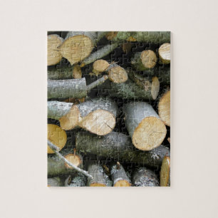 Pile von gestapeltem geschnittenem Feuerholz Puzzle