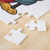 Pinguin als Feuerwehrmann mit Löschgerät Puzzle (Seite)