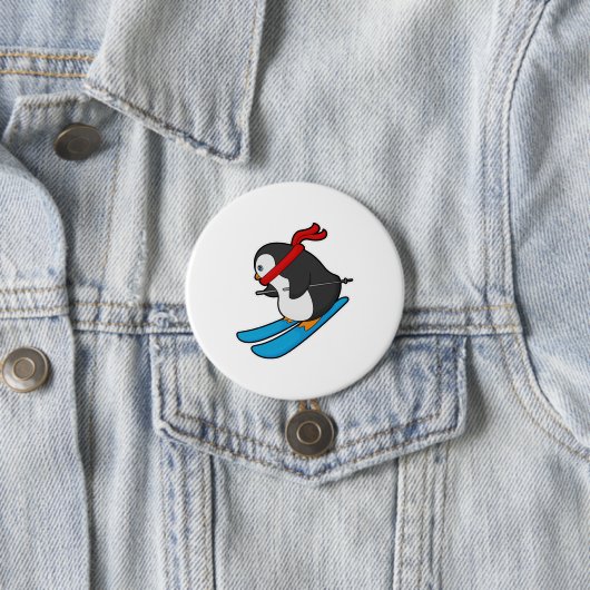 Pinguin als Skifahrer mit Ski Button (Beispiel)