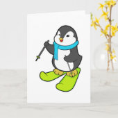 Pinguin als Skifahrer mit Ski Karte (Gelbe Blume)