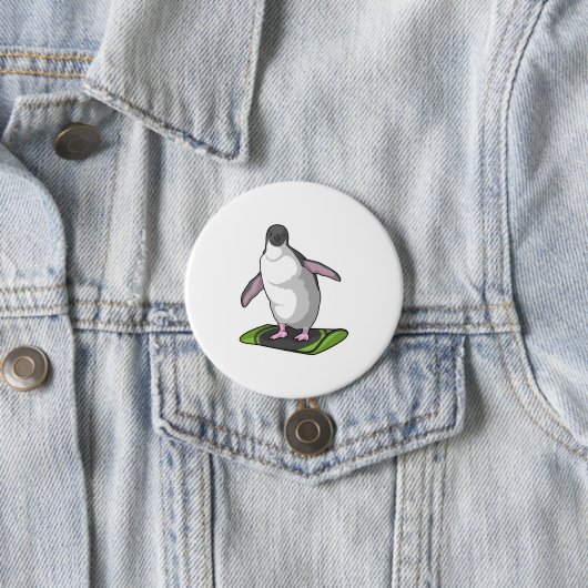 Pinguin als Snowboarder mit Snowboard Button (Beispiel)