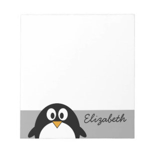 Pinguin aus niedlichem Cartoon mit grauem Hintergr Notizblock
