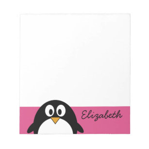 Pinguin aus niedlichem Cartoon mit rosa Hintergrun Notizblock