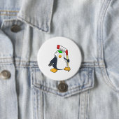 Pinguin beim Eishockey mit Eishockeyschläger Button (Beispiel)