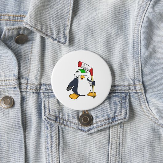 Pinguin beim Eishockey mit Eishockeyschläger Button (Beispiel)