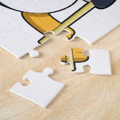 Pinguin beim Eishockey mit Eishockeyschläger Puzzle (Seite)