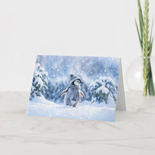 Pinguin im Schnee, der mit Hut abkühlt, Weihnachte Karte