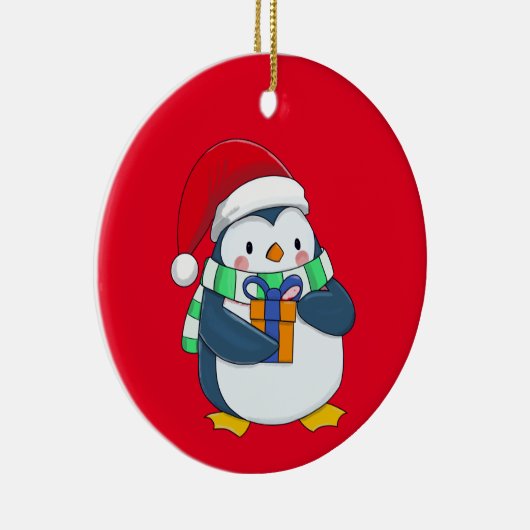 Pinguin in einem Weihnachtshut mit Geschenk Keramik Ornament (Rechts)