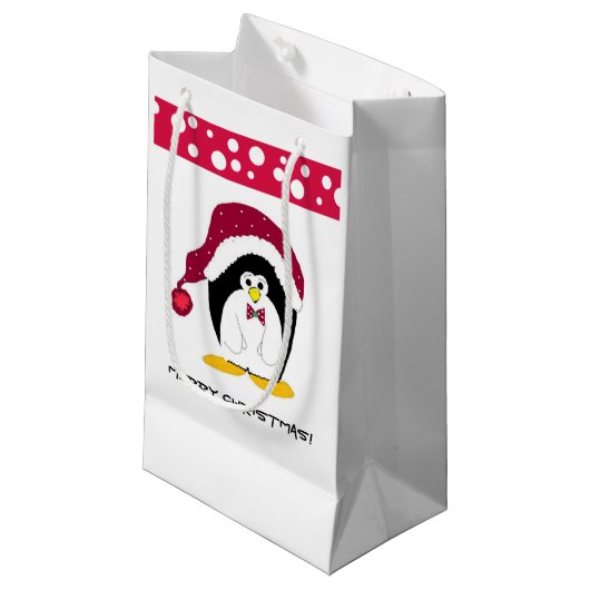 Pinguin in einer Weihnachtsmannmütze Kleine Geschenktüte (Vorderseite Schrägansicht)