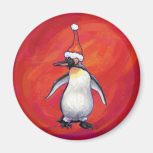 Pinguin in Weihnachtsmannmütze auf Rot Magnet