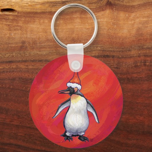 Pinguin in Weihnachtsmannmütze auf Rot Schlüsselanhänger (Vorderseite)