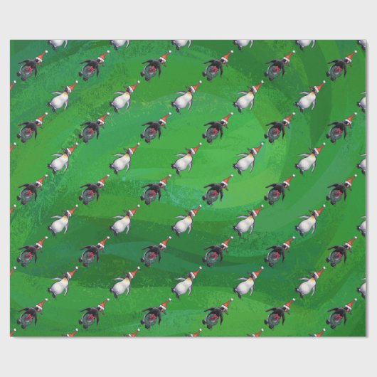 Pinguin in Weihnachtsmannmütze Pattern auf Grün Geschenkpapier (Flach)