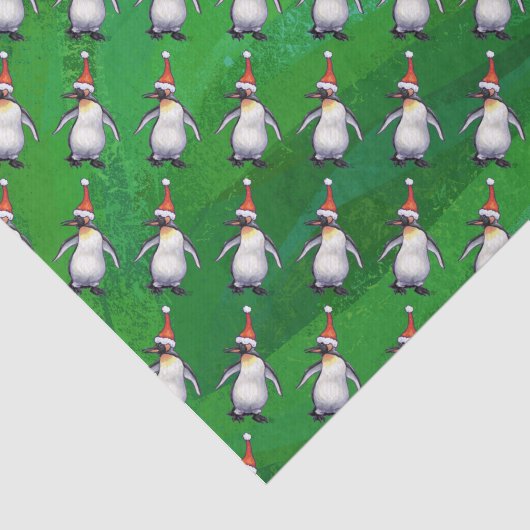 Pinguin in Weihnachtsmannmütze Pattern auf Grün Seidenpapier (Ausschnitt)