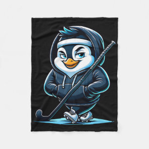 Pinguin-Maskottchen für Eishockey mit Schläger und Fleecedecke