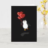 Pinguin mit Herzballons. Karte (Gelbe Blume)