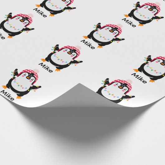 Pinguin mit Weihnachtsbeleuchtung Geschenkpapier (Ecke)