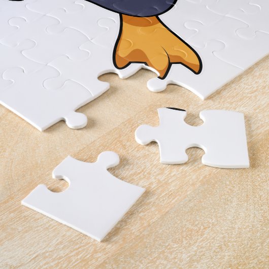 Pinguin mit Yo-Yo Puzzle (Seite)